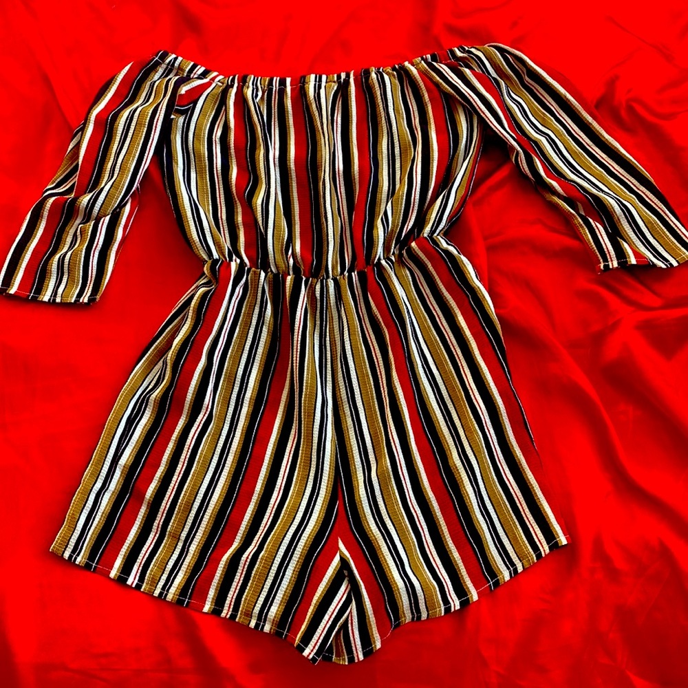 Romper small from purple snow